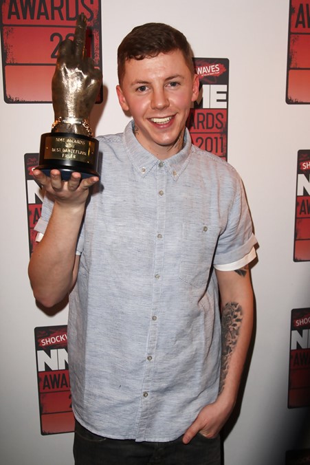 The rapper with his NME Award.