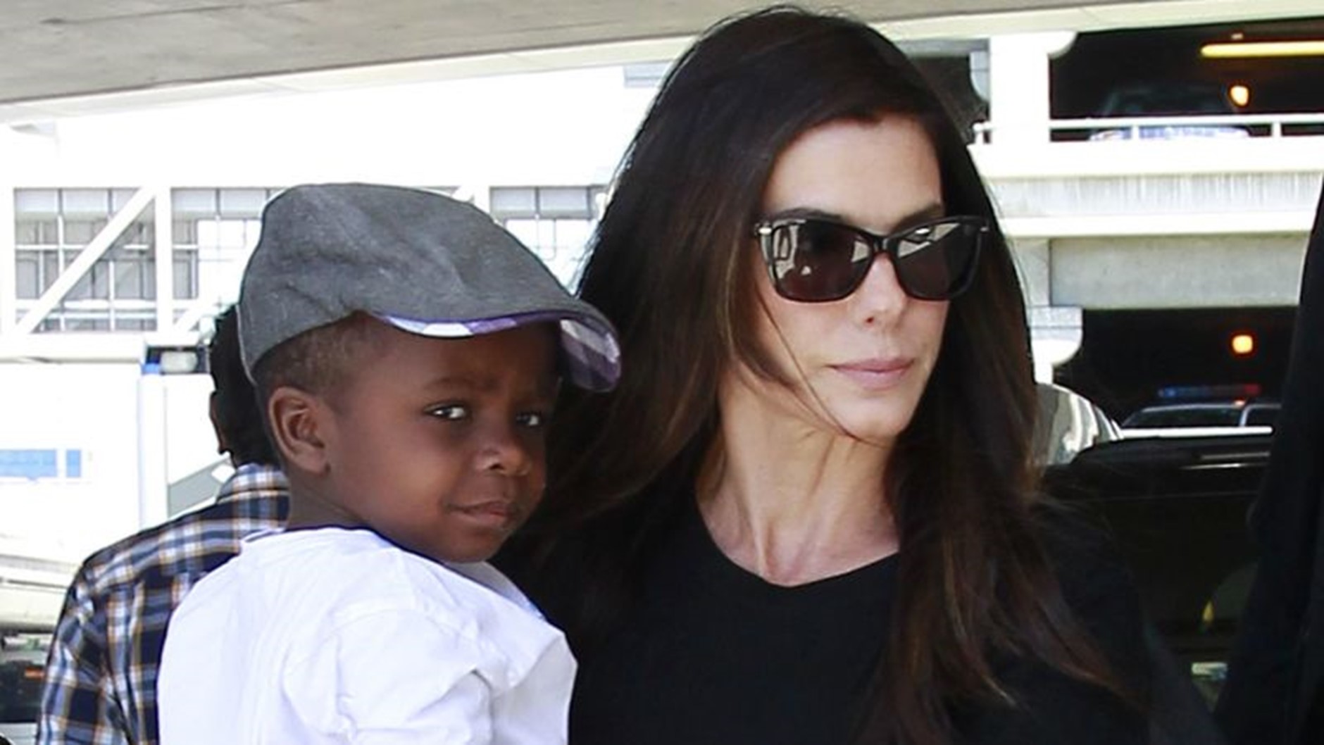 Sandra Bullock Son: Caring for Louis.