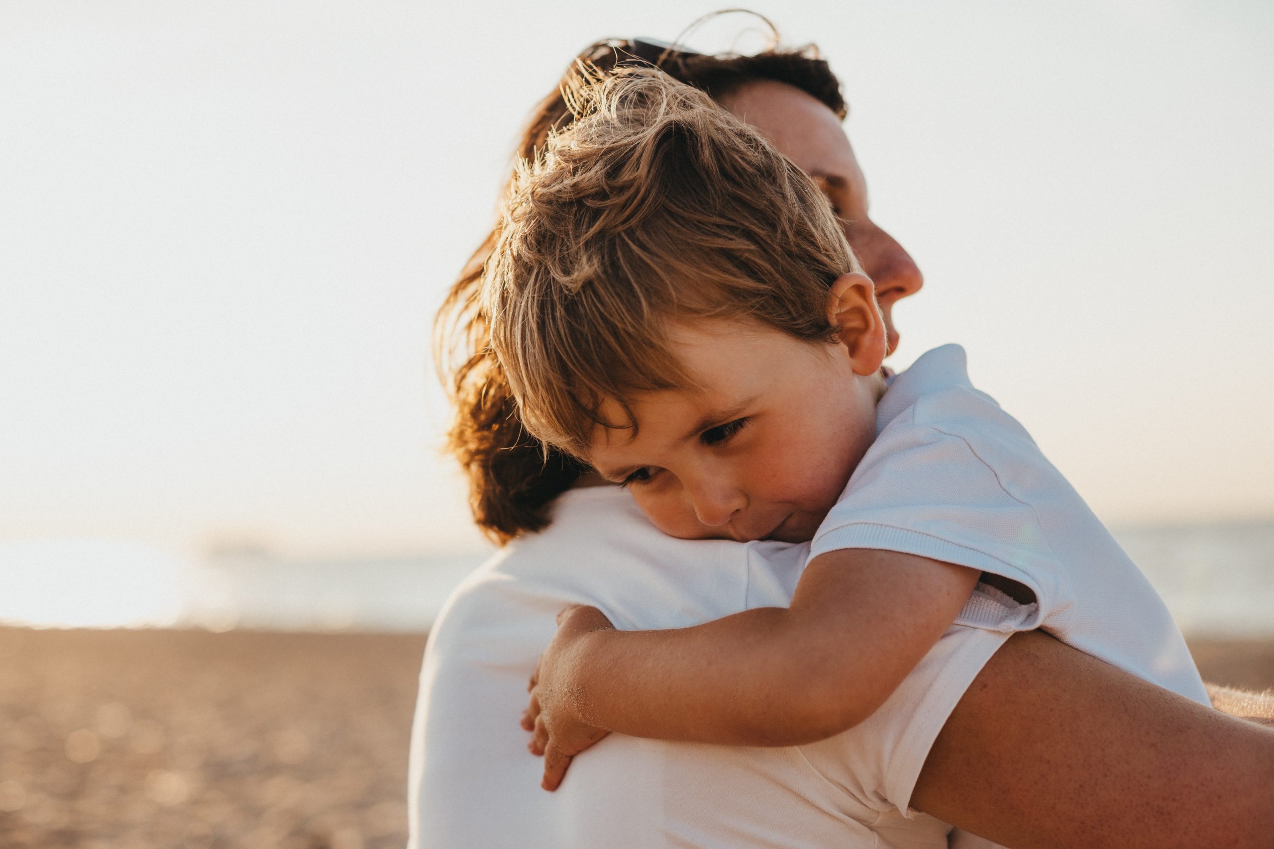 Woman Holding Boy