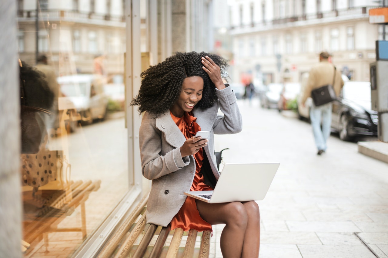 Woman Touching Hair Outside