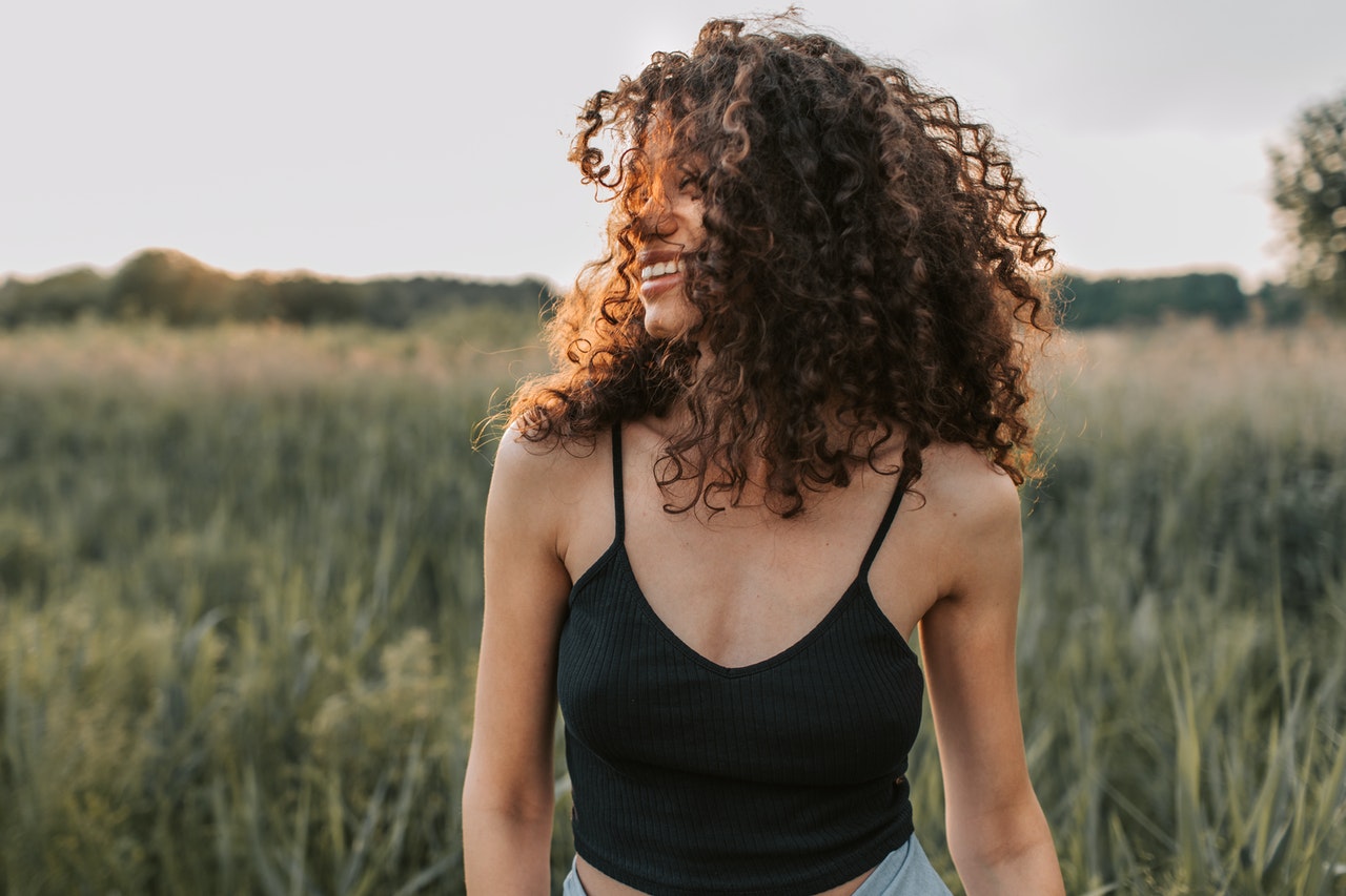 Woman with Curly Hair Outside